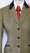 J 60 pale green tweed with gold, orange, blue and burgundy overcheck.jpg